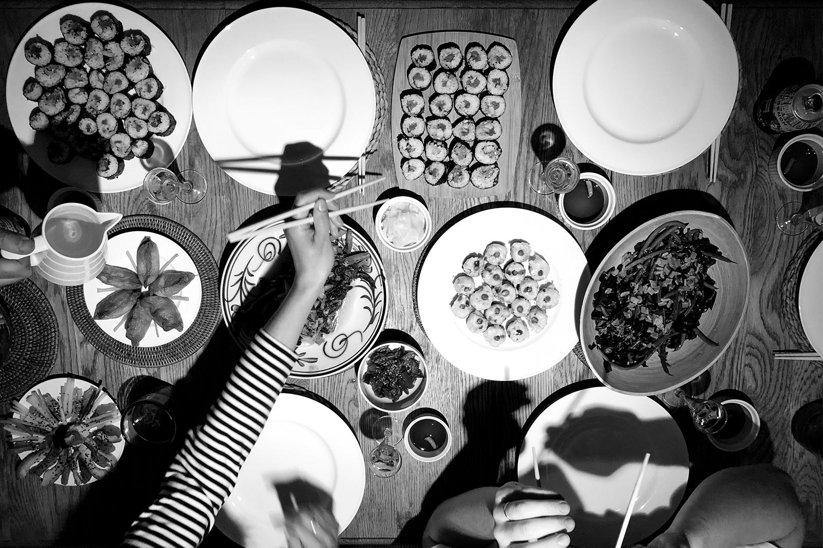 Overview of table with various sushi plates from O Street Design Studio's Annual Fishing Trip.